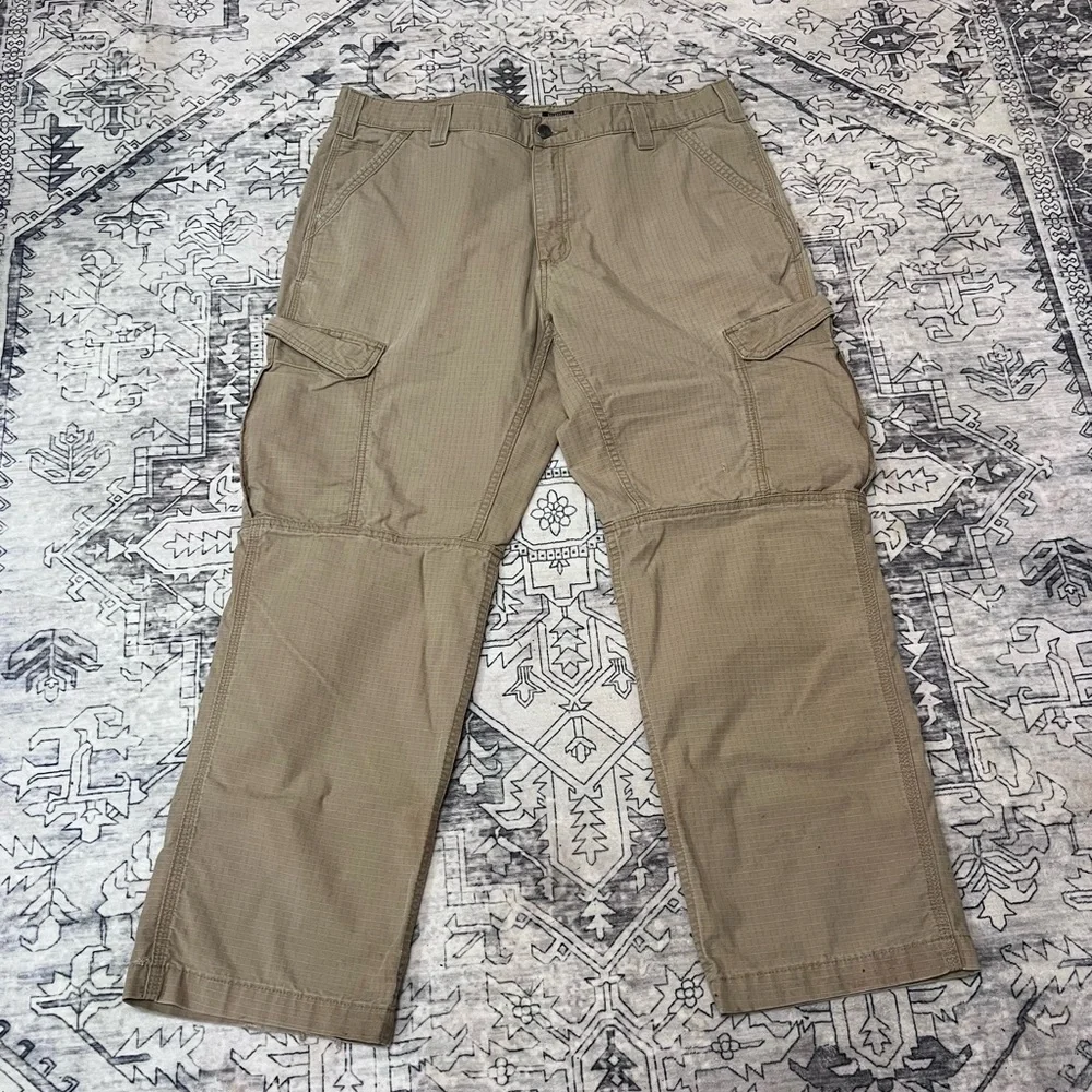 TWO pair of carhartt relaxed fit khakis - 38X30